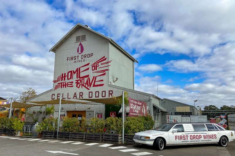 A car is parked in front of a wine cellar door in the Barossa Valley.