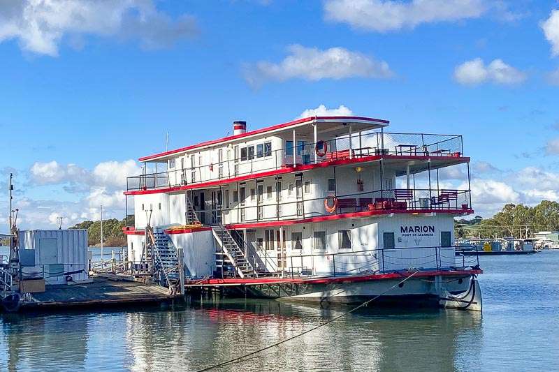 A paddle-steamer sitting at a dock on the Murray River